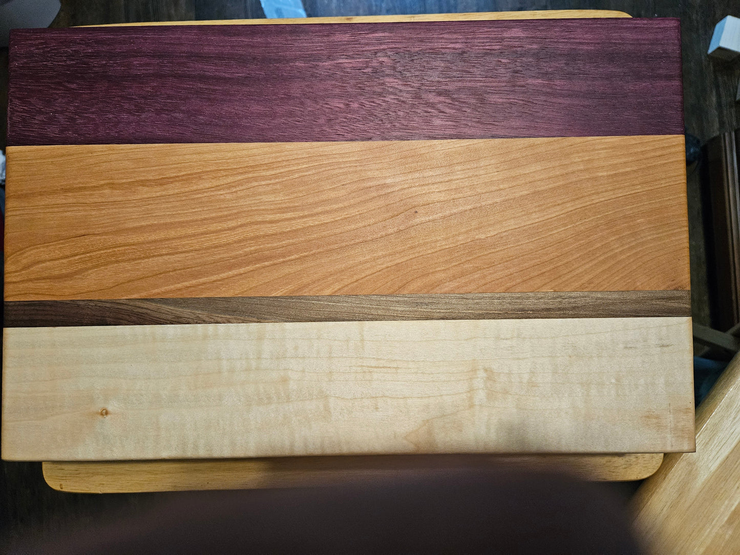 Large Cherry, Walnut, maple and purple heart Cutting Board with finger grips