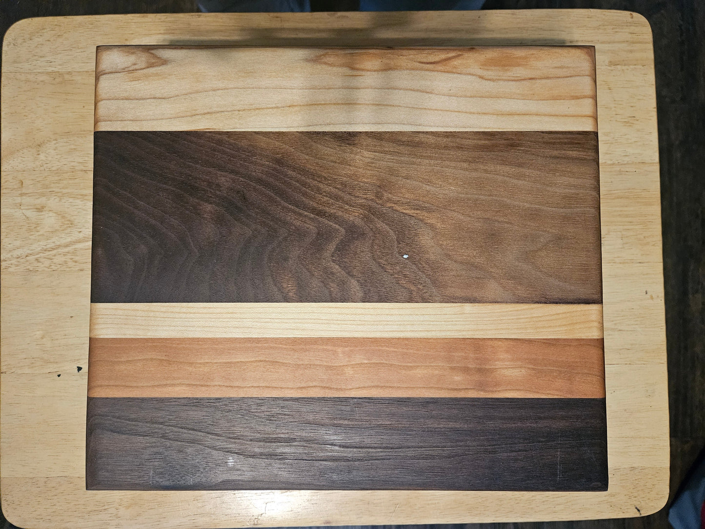 Cutting/Vegetable Board made w/ Walnut, cherry and Maple with finger grips 11" x 9"