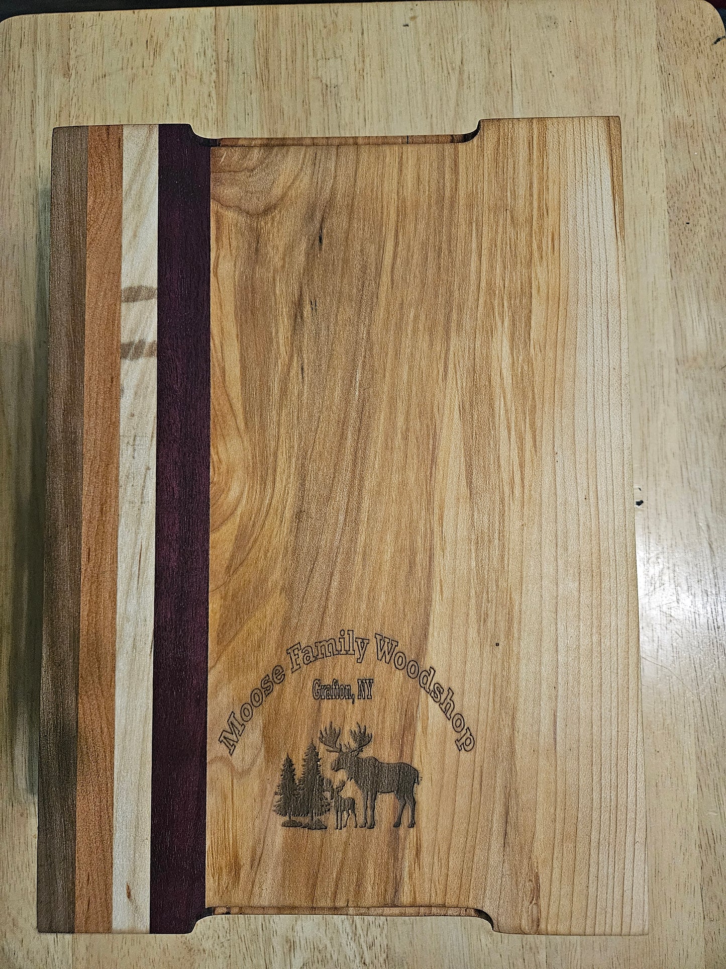 Cutting/Vegetable Board made w/ Walnut, Maple, cherry and Purple Heart with finger grips 11" x 9"