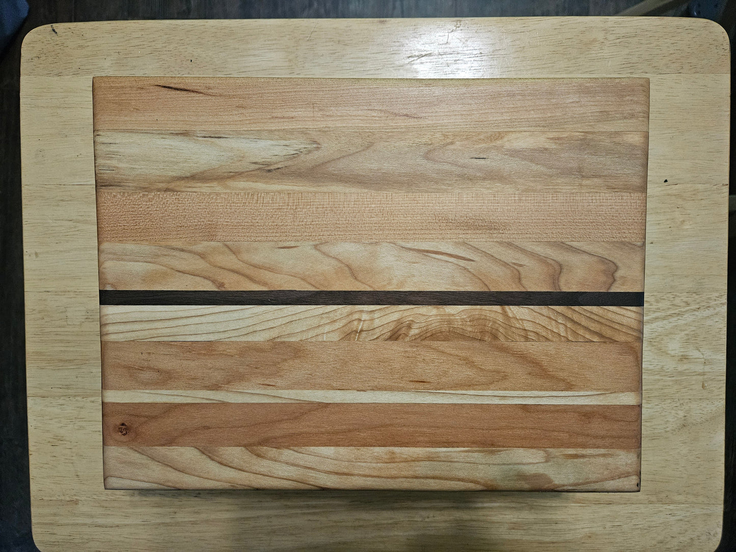 Cutting/Vegetable Board made w/ Walnut, cherry and Maple with finger grips 11" x 9"