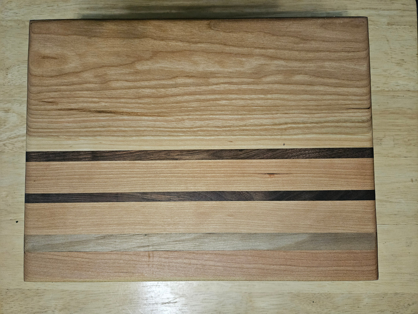 Cutting/Vegetable Board made w/ Walnut, Cherry and Hickory with finger grips 11" x 9"