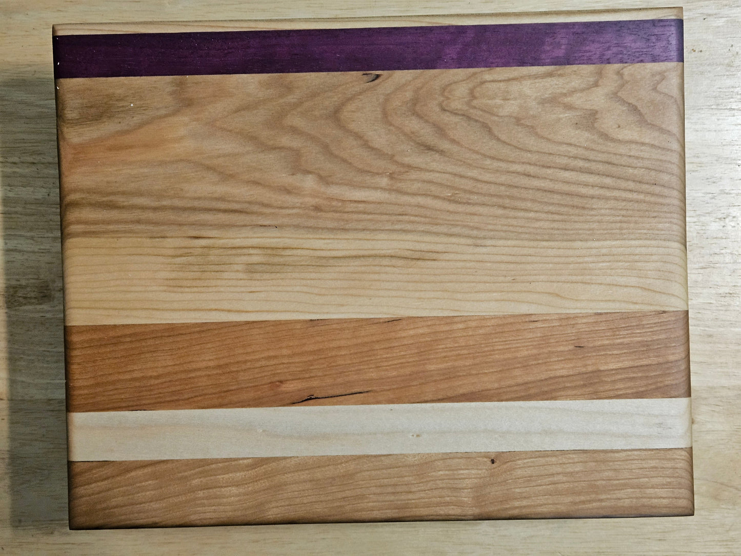 Cutting/Vegetable Board made w/ Purple Heart, Cherry and Maple with finger grips 11" x 9"