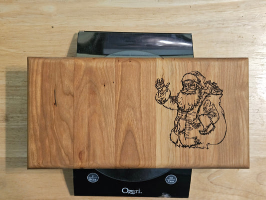 Vegetable/Cheese Cutting board made with Cherry  11" x 5.5" with Santa engraving