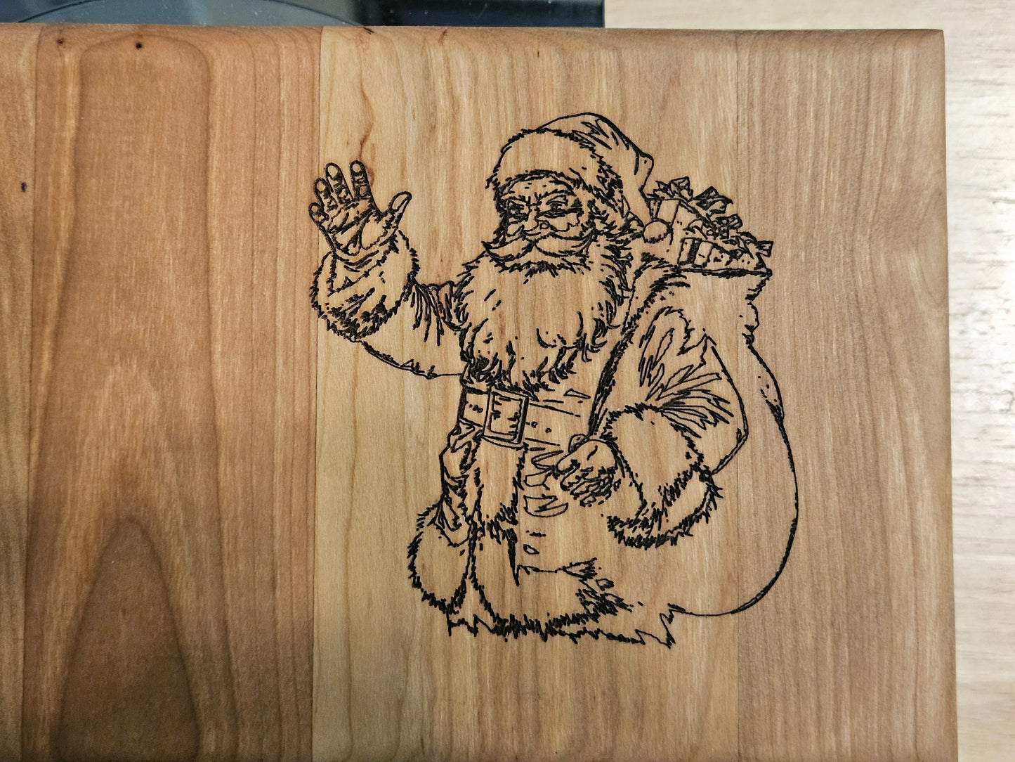 Vegetable/Cheese Cutting board made with Cherry  11" x 5.5" with Santa engraving