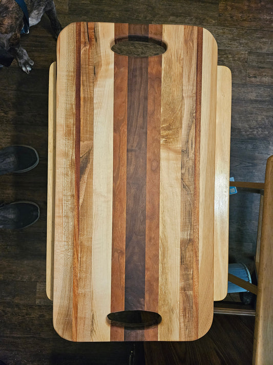 Large Maple, Walnut and Mahogany Cutting/Serving/Charcuterie Board with hand cutouts 24" x 12"